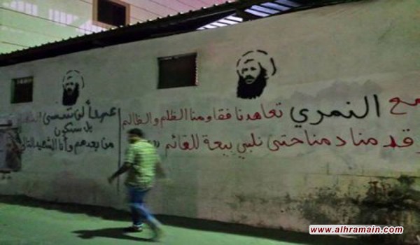 صور نمر النمر رجل الدين الشيعي تنتشر في بلدته العوامية في المنطقة الشرقية في السعودية